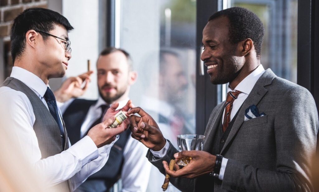 Coworkers talking during a networking event